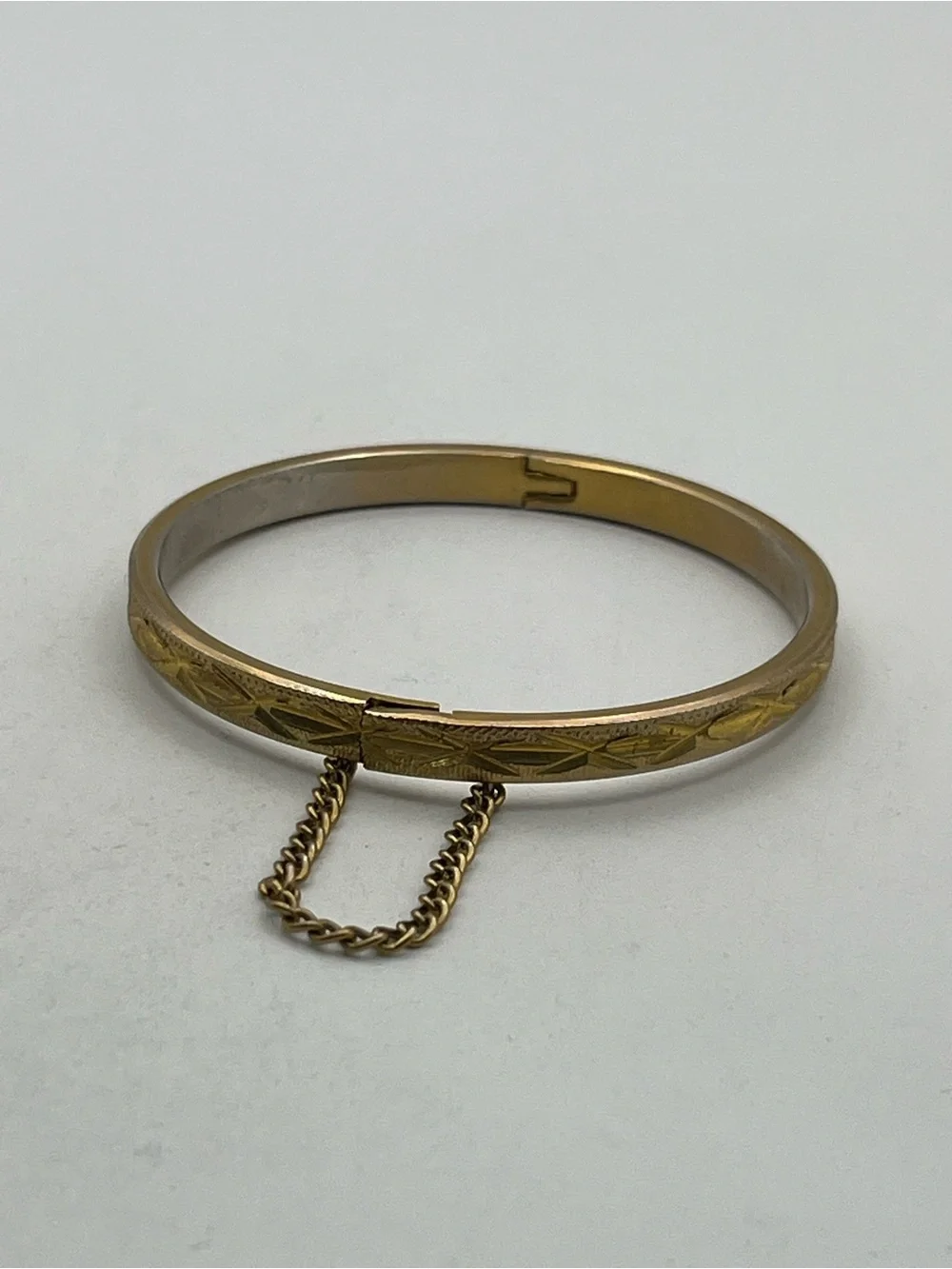 Etched design gold tone small child sized bangle bracelet vintage